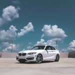 parked white BMW coupe